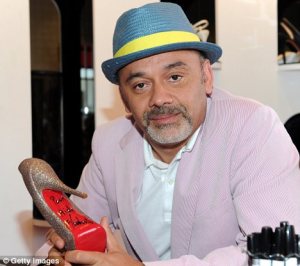 Louboutin with his famous "sammy red-bottoms"